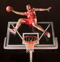 Henry Bekkering, freshman on Eastern Washington University's basketball team is famous<br/>for his amazing ability to jump over the basket