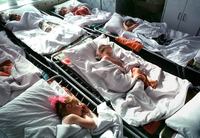 Children at naptime in daycare; Sovetskaya Gavan, Russia.