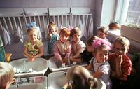 Russian children washing before lunch; Sovetskaya Gavan, Russia