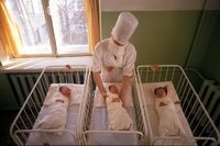 Swaddled newborns at maternity hospital; Sovetskaya Gavan, Russia