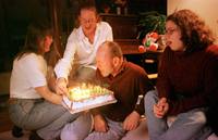 On Dale's 59th birthday, he was presented with a dinosaur birthday cake and serenaded by Bonnie, Nicolle and Renée.