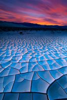 Cracked lake bed near Eureka Sand Dunes in Death Valley National Park, Mojave Desert, California