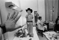 The night before surgery, gun-toting Sergei shoots back in his hospital room. Having been in the US<br/>for 3 months, he is in love with all things "American," from cowboys to video games.