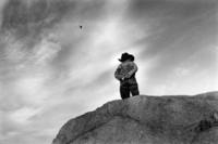 Sergei pauses during a kite-flying outing to Seattle's Myrtle Edwards Park, staring westward over Puget Sound,<br/>his gaze fixed on a point somewhere beyond infinity.