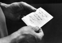 A piece of paper towel serves as a Russian phrase<br/>book for cardiac intensive care nurse Tim McKibben.