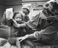 Four-year old Heather Eaton's neck, chest and shoulders were burned when she was playing with matches.<br/>During one of her twice-daily cleanings, she struggles as nurses tend to her burns.