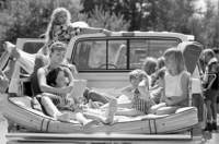 Counselors and campers pile into the pickup for a ride to the pool.